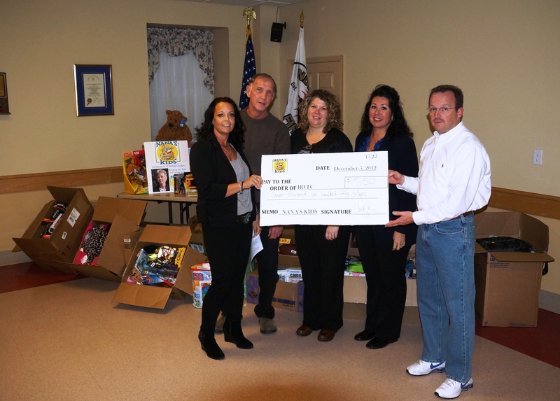 The first Nana's Kids Campaign, named in memory of Dorothy Gudger, gathered $11,950 for needy children in the Oak Orchard, Riverdale and Long Neck communities. Shown at the presentation of donations and money to the Indian River Volunteer Fire Company are (l-r) Carol Taylor, daughter of Dorothy Gudger; Ron Taylor, son-in-law; Pam Shockley, County Bank; Carmen Windsor, County Bank; and Patrick Miller, IRVFC. SOURCE SUBMITTED